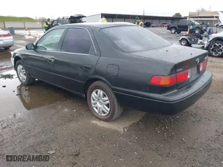 2000 Toyota Camry CE with VIN JT2BG22KXY0432288, listed as a IAAI auction lot 41927856 with 203,035 mi miles. Bid and sale history available at carsss.com. Image 3.