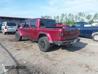 2021 Jeep Gladiator Mojave with VIN 1C6JJTEG8ML592381, listed as a IAAI auction lot 42369581 with 75,295 mi miles and . Bid and sale history available at DreamBid. Image 3.