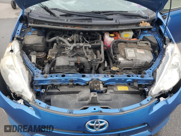 2012 Toyota Prius One z VIN JTDKDTB39C1507466, wystawiony jako Copart lot #55726175 z przebiegiem Nie podano mil oraz Szkoda całkowita • Salvage title. Historia ofert i sprzedaży dostępna na DreamBid. Obrazek 11.