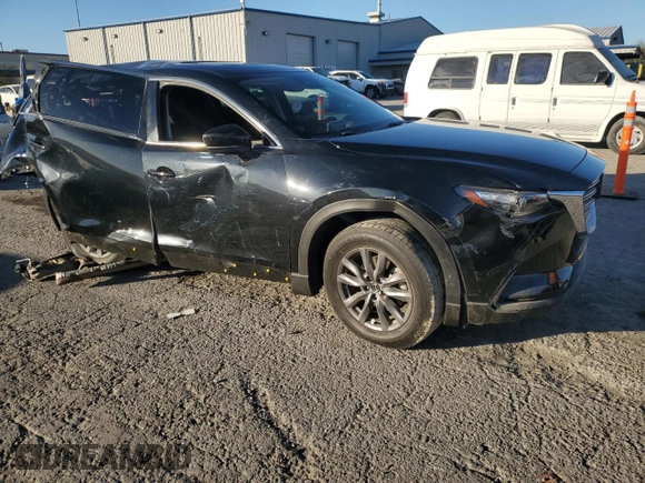 2021 Mazda CX-9 Touring with VIN JM3TCBCY0M0537921, listed as a Copart auction lot 82176424 with 51,592 mi miles and Salvage Title. Bid and sale history available at carsss.com. Image 4.