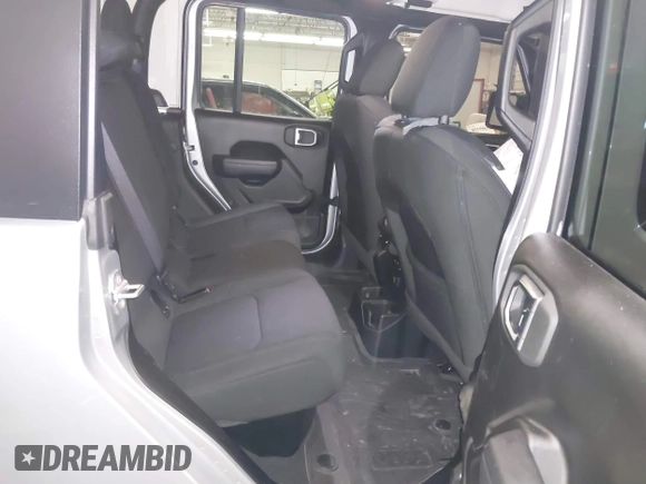 2023 Jeep Gladiator Sport S с VIN 1C6HJTAG1PL558131, выставлен на аукционе IAAI как лот 41252271 с пробегом 42 582 миль миль и . История ставок и продаж доступна на DreamBid. Изображение 8.