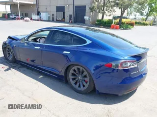 2017 Tesla Model S 100D with VIN 5YJSA1E44HF220391, listed as a IAAI auction lot 37381201 with Not Provided miles and . Bid and sale history available at DreamBid. Image 3.