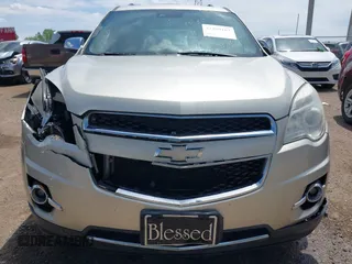 2014 Chevrolet Equinox LTZ z VIN 2GNFLDE33E6129917, wystawiony jako IAAI lot #42209167 z przebiegiem 190 445 mil mil oraz . Historia ofert i sprzedaży dostępna na DreamBid. Obrazek 12.