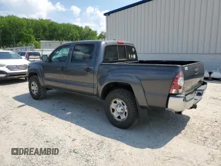 2010 Toyota Tacoma PreRunner with VIN 5TEJU4GNXAZ693226, listed as a Copart auction lot 54715525 with 176,874 mi miles and Salvage Title. Bid and sale history available at DreamBid. Image 2.