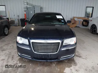 2011 Chrysler 300 with VIN 2C3CA4CGXBH523474, listed as a IAAI auction lot 41673690 with 187,389 mi miles. Bid and sale history available at carsss.com. Image 6.