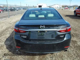 2021 Mazda 6 Signature with VIN JM1GL1XY7M1615149, listed as a IAAI auction lot 41851158 with 47,690 mi miles and . Bid and sale history available at DreamBid. Image 17.