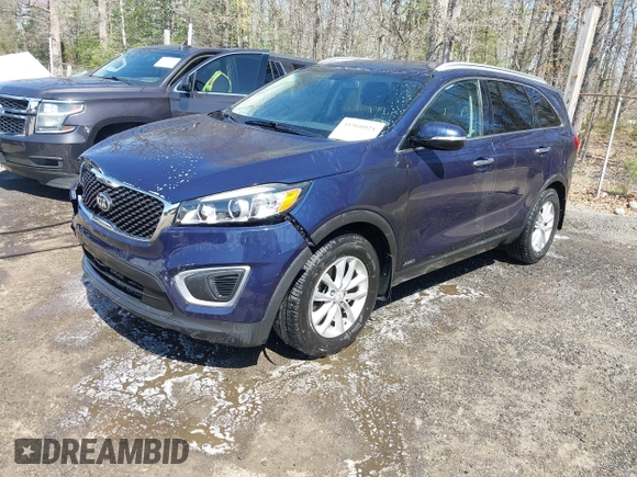 2016 Kia Sorento LX with VIN 5XYPGDA36GG009087, listed as a IAAI auction lot 41968021 with 150,658 mi miles. Bid and sale history available at carsss.com. Image 2.