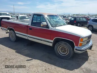 1990 Chevrolet Silverado 2500 z VIN 1GCFC24K4LZ215115, wystawiony jako IAAI lot #42306142 z przebiegiem 115 085 mil mil oraz . Historia ofert i sprzedaży dostępna na DreamBid. Obrazek 1.