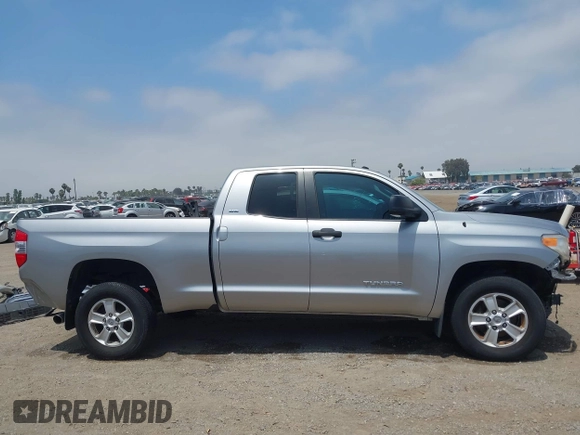 2016 Toyota Tundra SR z VIN 5TFRM5F1XGX099453, wystawiony jako IAAI lot #42492840 z przebiegiem 54 060 mil mil oraz . Historia ofert i sprzedaży dostępna na DreamBid. Obrazek 14.