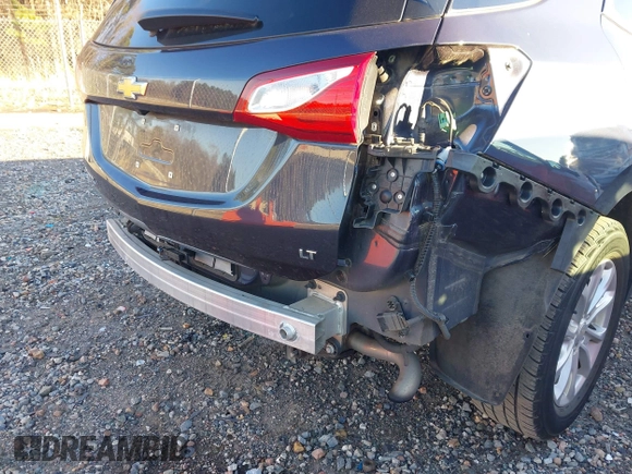 2019 Chevrolet Equinox LT z VIN 3GNAXKEVXKL243487, wystawiony jako IAAI lot #41217077 z przebiegiem 62 119 mil mil oraz . Historia ofert i sprzedaży dostępna na DreamBid. Obrazek 6.