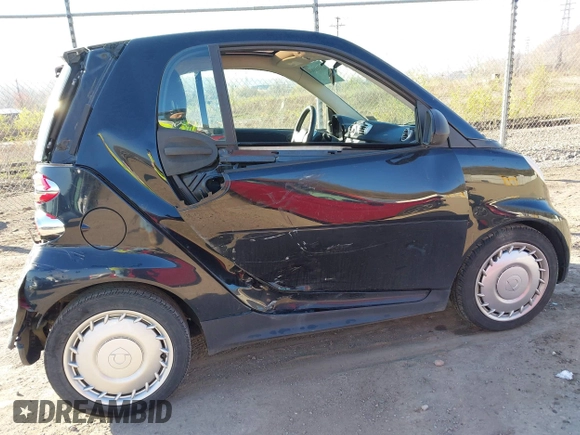 2015 Smart fortwo Passion with VIN WMEEJ3BA6FK804974, listed as a IAAI auction lot 42041904 with 97,514 mi miles and . Bid and sale history available at DreamBid. Image 6.