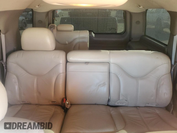 2002 GMC Yukon SLE with VIN 1GKEK13V82R169506, listed as a Copart auction lot 76829664 with 229,114 mi miles and Salvage Title. Bid and sale history available at carsss.com. Image 10.