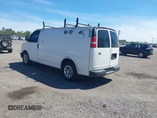 2010 Chevrolet Express Cargo Van with VIN 1GCUGADX2A1146132, listed as a IAAI auction lot 41872766 with 167,063 mi miles. Bid and sale history available at carsss.com. Image 3.