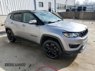 2019 Jeep Compass Latitude with VIN 3C4NJDBB2KT621111, listed as a Copart auction lot 50031545 with 117,379 mi miles and Salvage Title. Bid and sale history available at DreamBid. Image 4.
