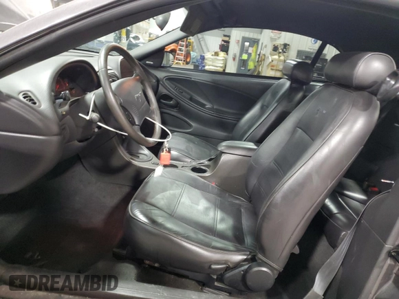 2003 Ford Mustang Deluxe z VIN 1FAFP44433F369534, wystawiony jako Copart lot #76606794 z przebiegiem 88 503 mil mil oraz Szkoda całkowita • Salvage title. Historia ofert i sprzedaży dostępna na DreamBid. Obrazek 7.