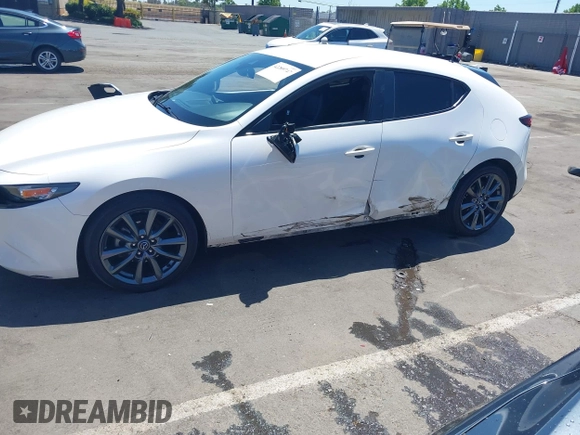 2021 Mazda 3 Select z VIN JM1BPAKLXM1321304, wystawiony jako IAAI lot #42289747 z przebiegiem Nie podano mil oraz . Historia ofert i sprzedaży dostępna na DreamBid. Obrazek 6.