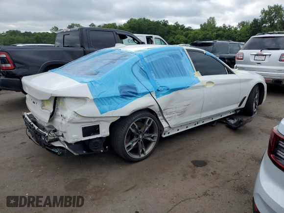 2018 BMW 5 Series M550i xDrive with VIN WBAJB9C5XJB035996, listed as a Copart auction lot 61459425 with Not provided miles and Salvage title. Bid and sale history available at DreamBid. Image 3.