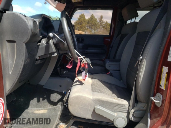 2008 Jeep Wrangler Unlimited X with VIN 1J8GA391X8L592843, listed as a Copart auction lot 53047215 with 239,726 mi miles and Salvage Title. Bid and sale history available at DreamBid. Image 7.