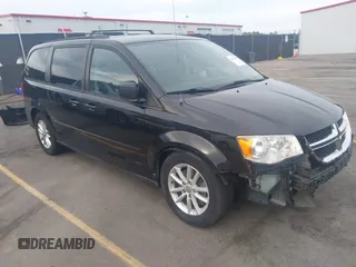 2014 Dodge Grand Caravan SXT z VIN 2C4RDGCG6ER121299, wystawiony jako IAAI lot #42274209 z przebiegiem 239 235 mil mil oraz . Historia ofert i sprzedaży dostępna na DreamBid. Obrazek 1.