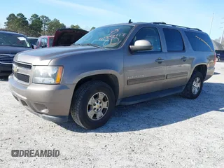 2011 Chevrolet Suburban LT with VIN 1GNSCJE00BR122636, listed as a IAAI auction lot 41594772 with 202,433 mi miles. Bid and sale history available at carsss.com. Image 2.