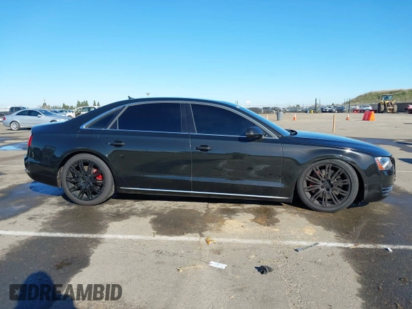 2011 Audi A8 z VIN WAURVAFD6BN019339, wystawiony jako IAAI lot #41560306 z przebiegiem 123 726 mil mil oraz . Historia ofert i sprzedaży dostępna na DreamBid. Obrazek 13.