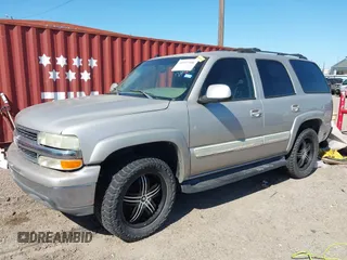 2004 Chevrolet Tahoe LS z VIN 1GNEC13Z14R286866, wystawiony jako IAAI lot #41957346 z przebiegiem 262 316 mil mil oraz . Historia ofert i sprzedaży dostępna na DreamBid. Obrazek 2.