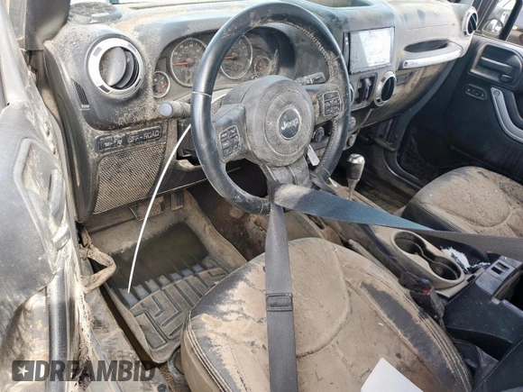 2015 Jeep Wrangler Unlimited Rubicon z VIN 1C4BJWFG0FL529310, wystawiony jako Copart lot #64337405 z przebiegiem Nie podano mil oraz Szkoda całkowita • Salvage title. Historia ofert i sprzedaży dostępna na DreamBid. Obrazek 8.