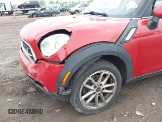 2015 MINI Countryman S with VIN WMWZC3C56FWP53249, listed as a IAAI auction lot 42256130 with 104,415 mi miles and . Bid and sale history available at DreamBid. Image 6.