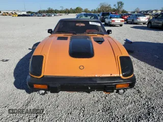1983 Datsun 280ZX z VIN JN1HZ04S1DX572036, wystawiony jako Copart lot #76533294 z przebiegiem 172 147 mil mil oraz Nie do naprawy. Historia ofert i sprzedaży dostępna na DreamBid. Obrazek 5.