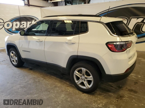 2023 Jeep Compass Latitude z VIN 3C4NJDBN7PT552997, wystawiony jako Copart lot #64716475 z przebiegiem 58 066 mil mil oraz Czysty tytuł • Clean title. Historia ofert i sprzedaży dostępna na DreamBid. Obrazek 2.