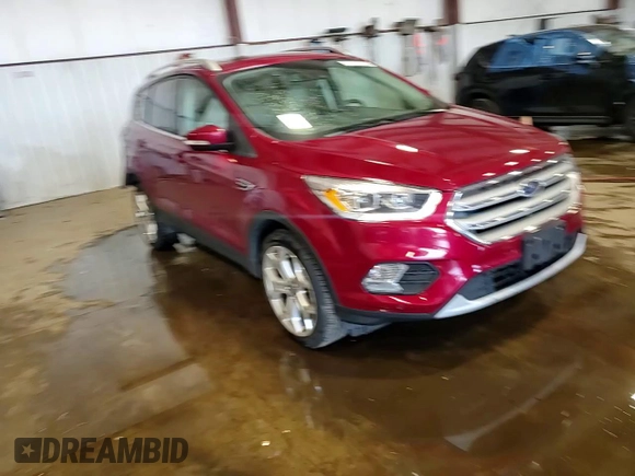 2019 Ford Escape Titanium with VIN 1FMCU9J98KUB93072, listed as a Copart auction lot 61931205 with 64,412 mi miles and Salvage title. Bid and sale history available at DreamBid. Image 14.