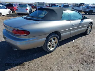 1999 Chrysler Sebring JXi with VIN 3C3EL55H8XT571486, listed as a IAAI auction lot 40755184 with 163,286 mi miles and . Bid and sale history available at DreamBid. Image 4.