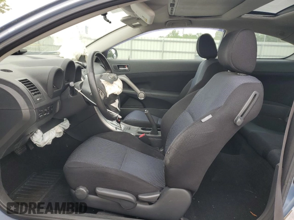 2008 Scion tC Spec with VIN JTKDE167180226016, listed as a Copart auction lot 53718005 with 117,463 mi miles and Salvage Title. Bid and sale history available at DreamBid. Image 7.