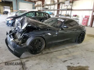 2010 BMW Z4 sDrive35i с VIN WBALM7C59AE382192, выставлен на аукционе Copart как лот 58552575 с пробегом 95 140 миль миль и Списание • Salvage title. История ставок и продаж доступна на DreamBid. Изображение 1.
