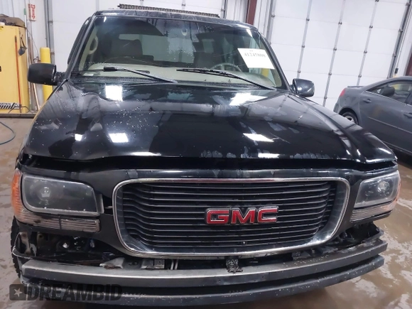 2000 GMC Denali with VIN 1GKEK13R9YR163824, listed as a IAAI auction lot 41245808 with 206,773 mi miles. Bid and sale history available at carsss.com. Image 12.
