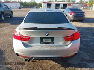 2015 BMW 4 Series 428i xDrive z VIN WBA3N9C56FK246118, wystawiony jako IAAI lot #41923623 z przebiegiem 113 207 mil mil oraz . Historia ofert i sprzedaży dostępna na DreamBid. Obrazek 17.