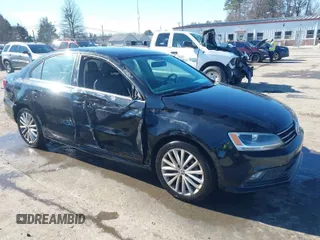 2015 Volkswagen Jetta Sedan 1.8T SE w/Connectivity with VIN 3VWD07AJ6FM303403, listed as a IAAI auction lot 41330778 with 150,949 mi miles. Bid and sale history available at carsss.com. Image 1.