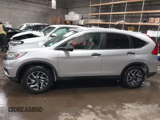 2016 Honda CR-V SE with VIN 2HKRM4H43GH696134, listed as a IAAI auction lot 41338376 with Not Provided miles and . Bid and sale history available at carsss.com. Image 13.