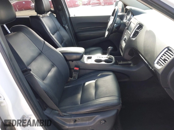 2013 Dodge Durango Crew with VIN 1C4SDHDT2DC679600, listed as a IAAI auction lot 42215737 with 128,499 mi miles and . Bid and sale history available at DreamBid. Image 5.