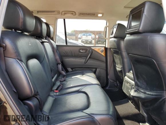 2012 Infiniti QX56 8-passenger with VIN JN8AZ2ND0C9715849, listed as a Copart auction lot 76386714 with 215,768 mi miles and Salvage Title. Bid and sale history available at carsss.com. Image 11.