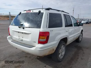 2001 Jeep Grand Cherokee Limited with VIN 1J4GW58N21C560302, listed as a IAAI auction lot 41072475 with 172,529 mi miles. Bid and sale history available at carsss.com. Image 4.
