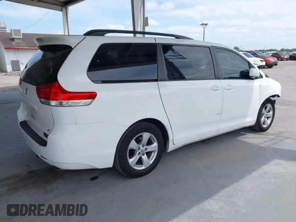 2014 Toyota Sienna LE AAS with VIN 5TDKK3DC2ES513425, listed as a IAAI auction lot 42107820 with 367,844 mi miles and . Bid and sale history available at carsss.com. Image 4.