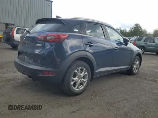 2018 Mazda CX-3 Sport z VIN JM1DKFB79J1323497, wystawiony jako Copart lot #56168875 z przebiegiem 60 284 mil mil oraz Szkoda całkowita • Salvage title. Historia ofert i sprzedaży dostępna na DreamBid. Obrazek 3.