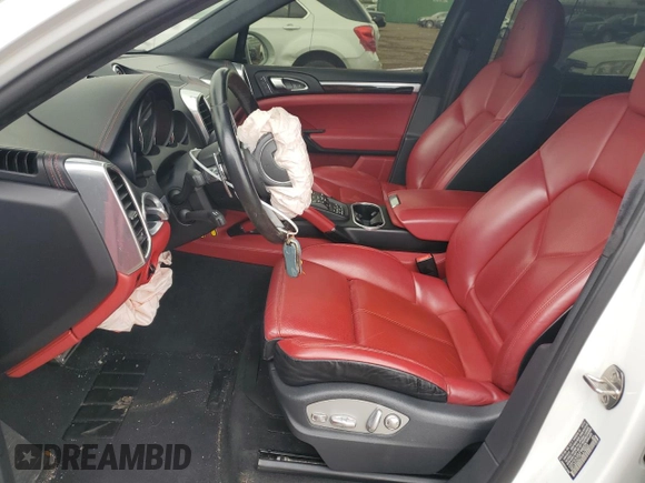 2016 Porsche Cayenne GTS with VIN WP1AD2A27GLA76553, listed as a Copart auction lot 53569615 with 69,761 mi miles and Salvage title. Bid and sale history available at DreamBid. Image 7.