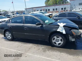 2003 Nissan Altima S with VIN 1N4AL11D03C129562, listed as a IAAI auction lot 41911150 with 205,862 mi miles. Bid and sale history available at carsss.com. Image 13.