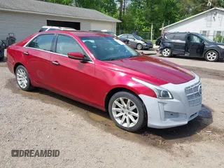 2014 Cadillac CTS AWD z VIN 1G6AW5SX3E0129127, wystawiony jako IAAI lot #42193399 z przebiegiem 108 037 mil mil oraz . Historia ofert i sprzedaży dostępna na DreamBid. Obrazek 1.