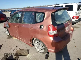 2007 Honda Fit Sport with VIN JHMGD38637S038204, listed as a Copart auction lot 84936024 with 199,066 mi miles and Salvage title. Bid and sale history available at DreamBid. Image 2.