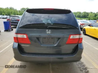 2006 Honda Odyssey EX with VIN 5FNRL38416B446272, listed as a Copart auction lot 57165545 with 219,042 mi miles and Salvage title. Bid and sale history available at DreamBid. Image 6.