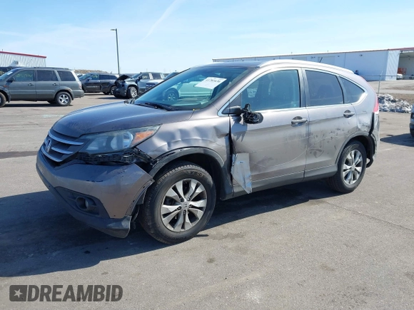2012 Honda CR-V EX-L with VIN 5J6RM4H78CL017629, listed as a IAAI auction lot 41781636 with 212,279 mi miles. Bid and sale history available at carsss.com. Image 2.