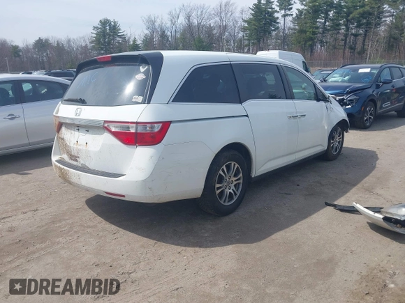 2012 Honda Odyssey EX-L with VIN 5FNRL5H65CB082916, listed as a IAAI auction lot 42052713 with 217,267 mi miles and . Bid and sale history available at carsss.com. Image 4.